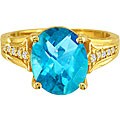 10k Gold BlueTopaz and 1/8ct TDW Diamond Ring