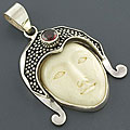 Sterling Silver Carved Bone and Garnet Pendant (Indonesia)