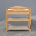 Sleigh Changing Table with Drawer in Golden Natural