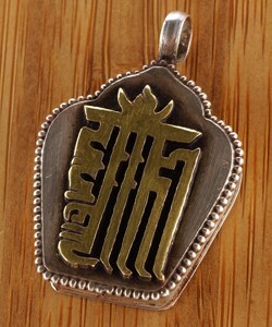 Silver Pendant with Goldplated Kaalchakra in Newa Script (Nepal)