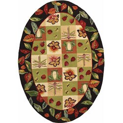 Hand-hooked Backyard Green Wool Rug (4'6 x 6'6 Oval).