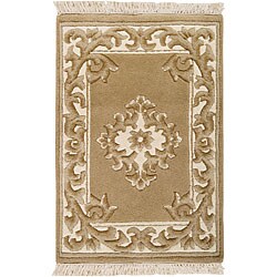 Hand-knotted Ganesh Gold Wool Rug (9' x 13')