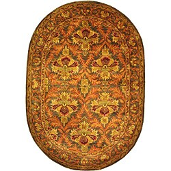 Hand-tufted Kerman Sage Gold Wool Rug (4'6 x 6'6 Oval).