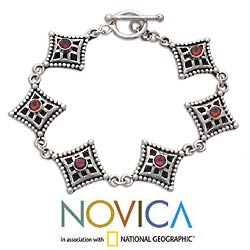 Garnet charm bracelet, 'Temple Window' (INDONESIA)