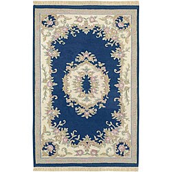 Hand-knotted Navy/ Ivory Wool Rug (3' x 5' Oval).