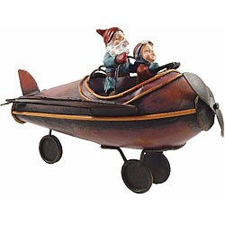 Red Santa and Boy on Plane Statue