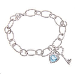 Sterling Silver Blue Topaz and Diamond Accent Charm Bracelet