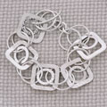 Handmade Sterling Silver Hammered Shapes Bracelet (Mexico)