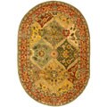 Hand-tufted Heritage Kerman Burgundy Wool Rug (4'6 x 6'6 Oval)