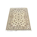 Sino Tabriz Hand-knotted Ivory Wool Rug (6' x 9')