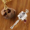 Silver Prayer Wheel Pendant with Small Garnet (Nepal)