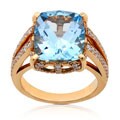 18k Gold Blue Topaz and 7/8ct TDW Diamond Ring (G-H, VS-SI)