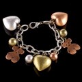 M. Haskell Copper Base Metal Heart Charm Bracelet
