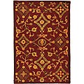 Handmade Burgundy Fable Wool Rug (5' x 8')