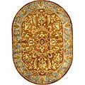 Shahi Brown/ Blue Oval Rug (7'6 x 9'6)