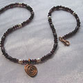 Handmade Copper Garnet Pearl 'Spiral Journey' Necklace (USA)
