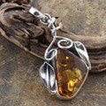 Sterling Silver Honey Amber Swirl Leaf Pendant (Poland)