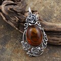 Sterling Silver Oval Amber Flower Pendant (Poland)