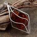 Sterling Silver Cognac Amber Diamond-shaped Pendant (Poland)