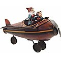 Red Santa and Boy on Plane Statue